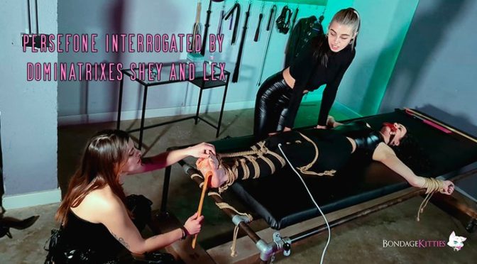 “Persefone Interrogated by Dominatrixes Shey and Lex” from Bondage Kitties